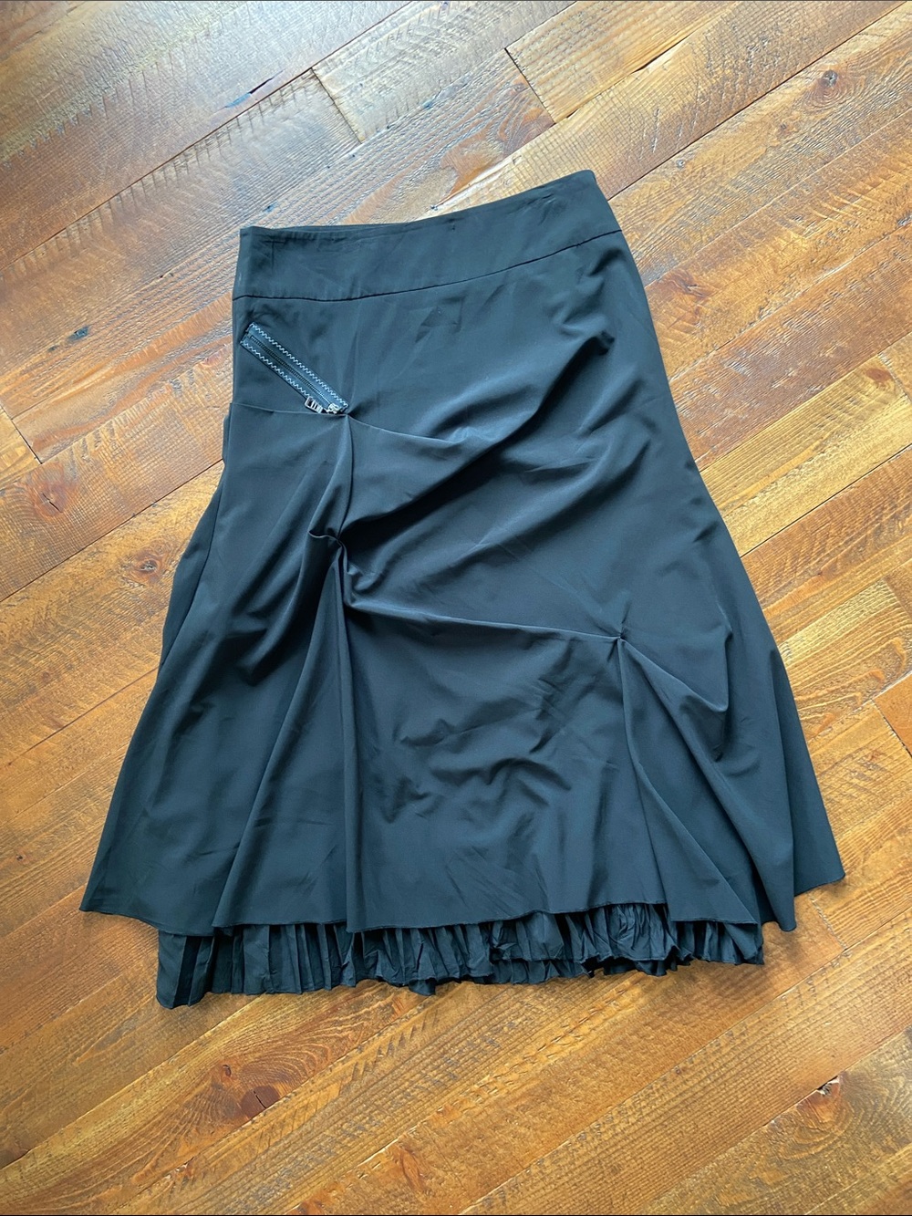 Black A-Line Skirt with Pleated Hem Detail
